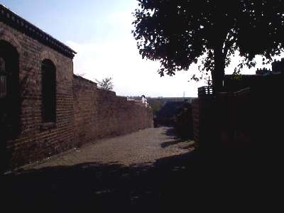 Looking down the cobbled part of Eastwood Road,