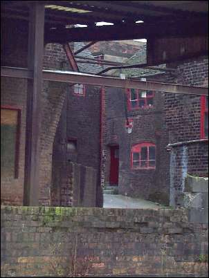 A view of the yard from across the canal