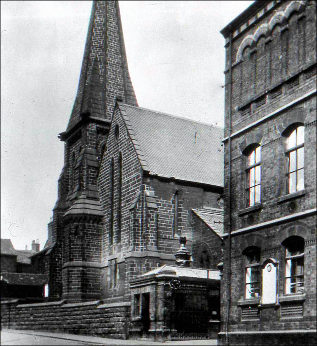 another view of the Holy Trinity Church on Nile Street, Doulton's China works to the right