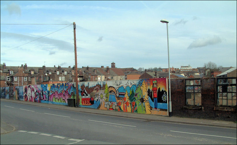 the site of the demolshed Stanley Works in Newport Lane -  a small amount of the factory wall remains