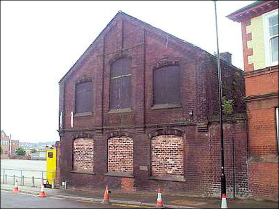 the view from Butterfield Place in 2000 - the remains the Unicorn Pottery next to a Solicitors office 