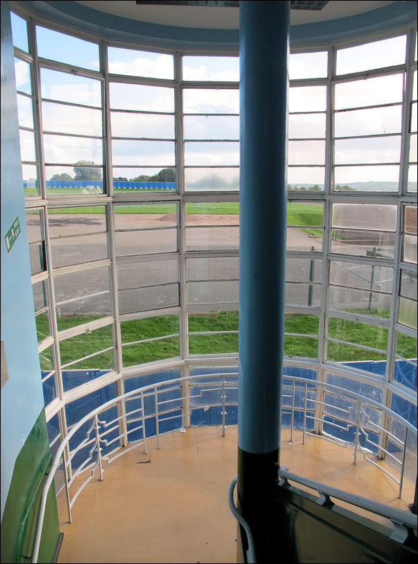 both of the rear stairwells have impressive floor to ceiling glass 