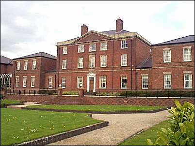 Across the canal the old Wedgwood mansion looks over the remains of Shelton works.