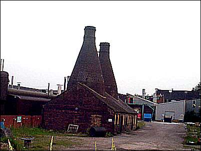 Updraught ovens in Circular hovels, contained in brick building.