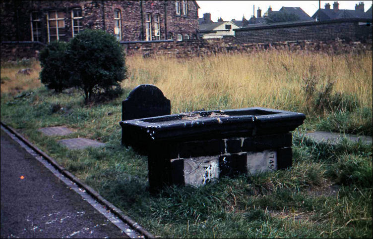 the tomb of Miss Margaret Leigh who was buried here on April Fool's Day, 1748