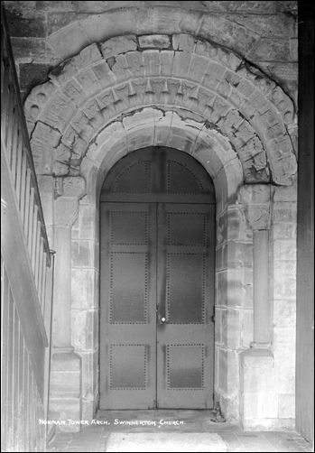 Postcard of church interior with a view of the Norman tower arch