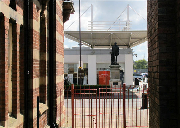 opposite the Library and the School of Art is the statue of Colin Minton Campbell 