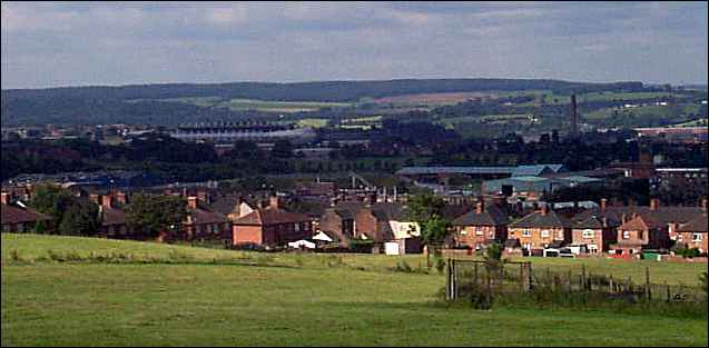 Fenpark Road runs from centre left to middle right - in the distance is Hanchurch Woods