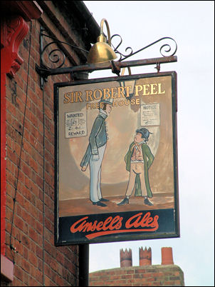 a beautifully hand-painted swinging-sign records its transfer to Ansells in the 1970’s