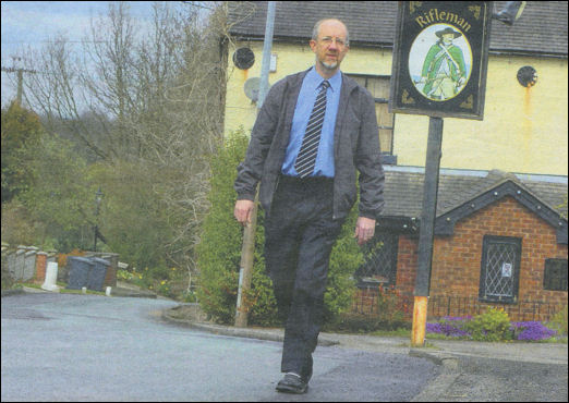 Steve Birks walks along Boathorse Road past the Rifleman pub