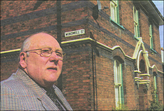 Don Henshall outside C McGough & Sons funeral directors in Tunstall
