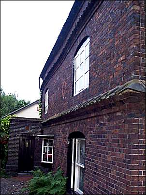 Side and entrance door to Elm Tree House