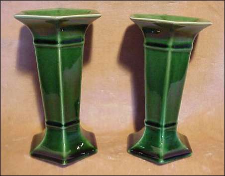 A pair of Wardle Art Pottery candle holders in rich green gloss glaze.